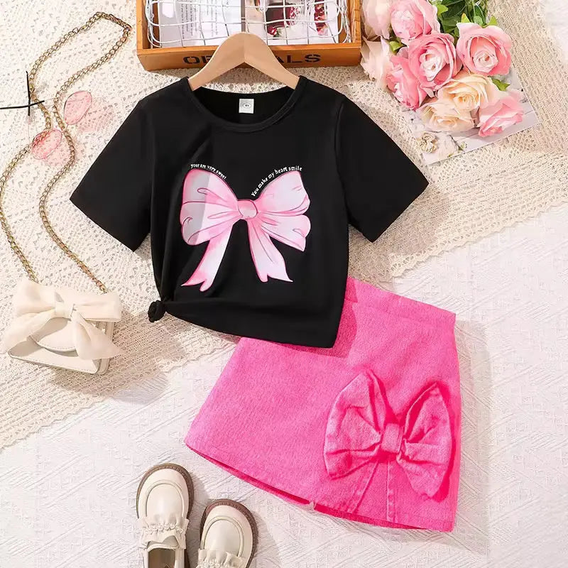 Girls Black Bow Top With Pink Skirt