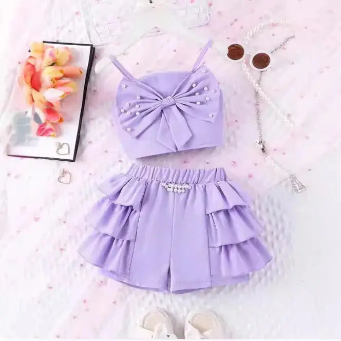 Girls Purple Solid Bow Top And Ruffled Shorts